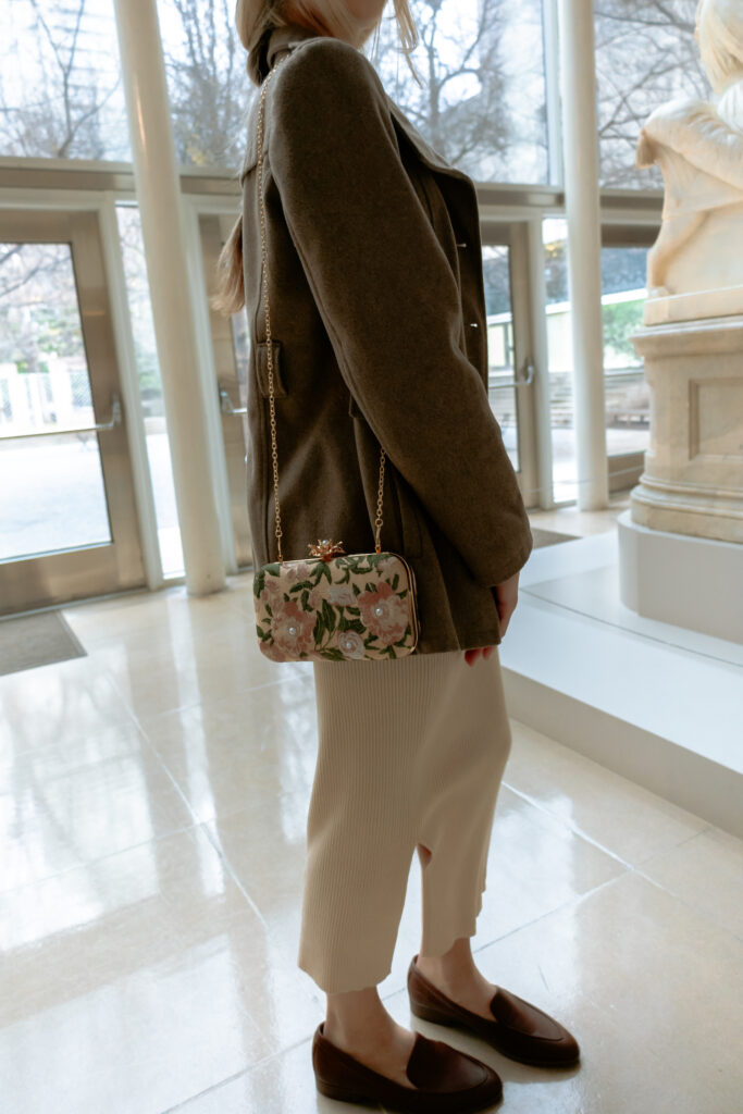 Detail photo of woman's artsy outfit at the museum