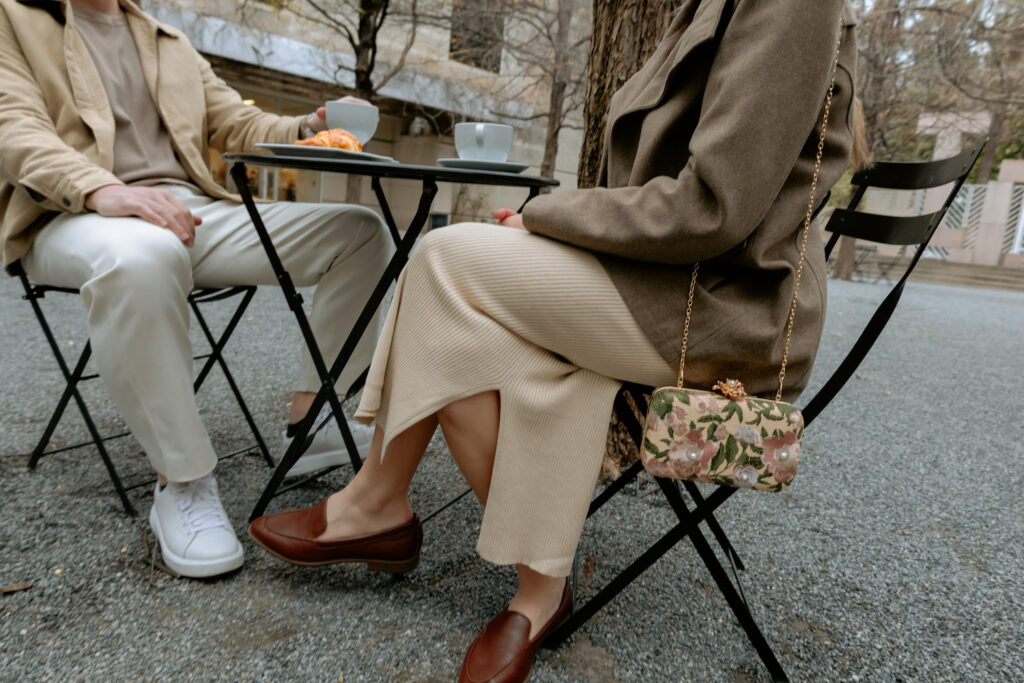 Photography of a couple sitting together at a coffee date