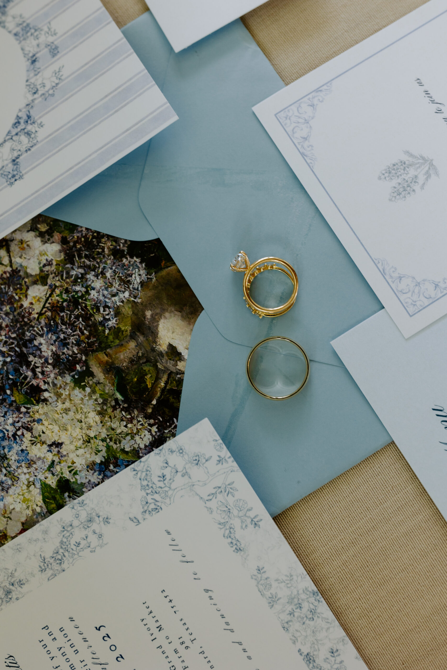 Blue wedding invitation cards, wedding rings