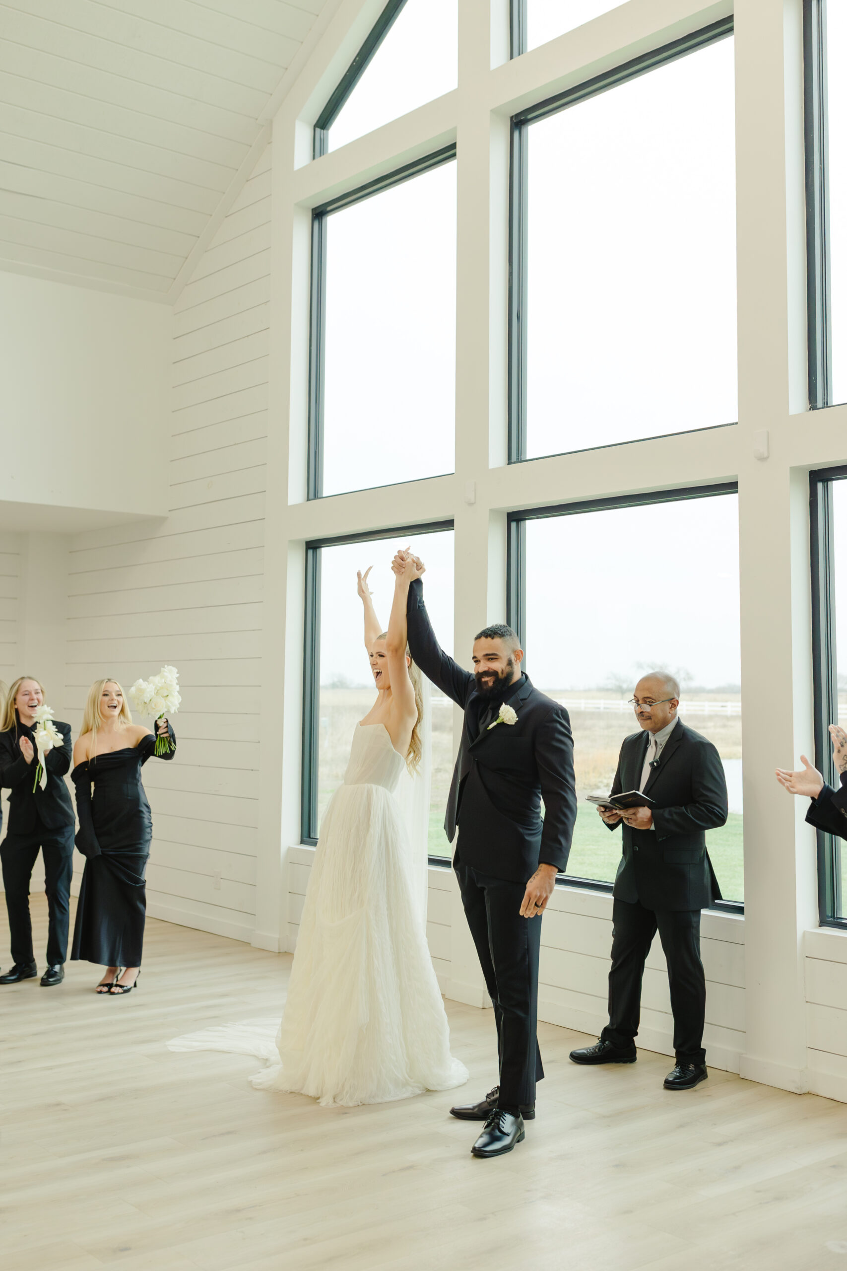 Bride and Groom celebrate in wedding chapel